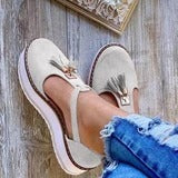 Celia - Black loafers with tassel and platform for stylish comfort
