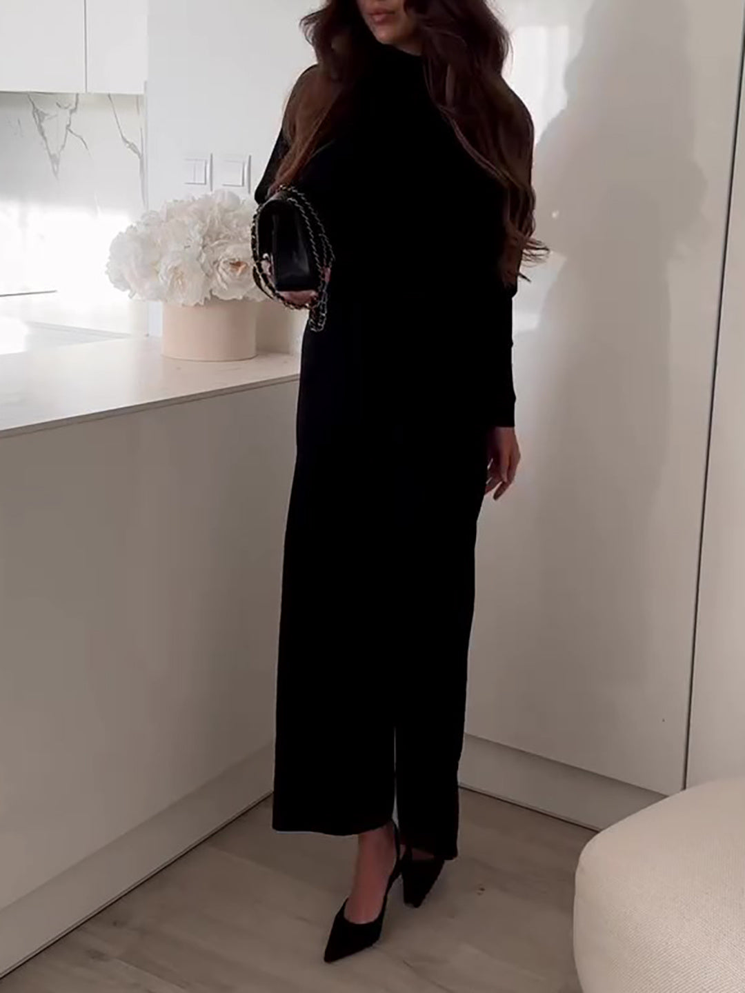 Daniela - Mono negro con espalda descubierta
