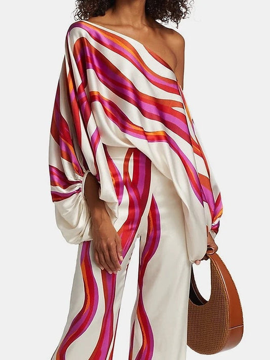 Naomi - Completo stampato con spalle scoperte e stile fluente