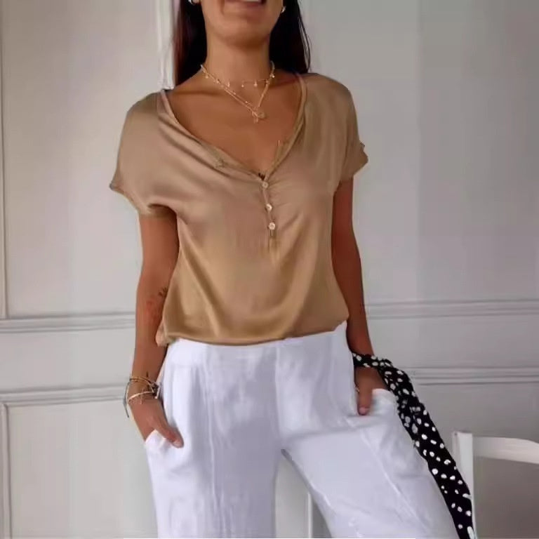 Naia - Blusa de satén abotonada de manga corta